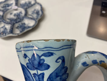A large Dutch Delft blue and white chinoiserie ewer, 17th C.